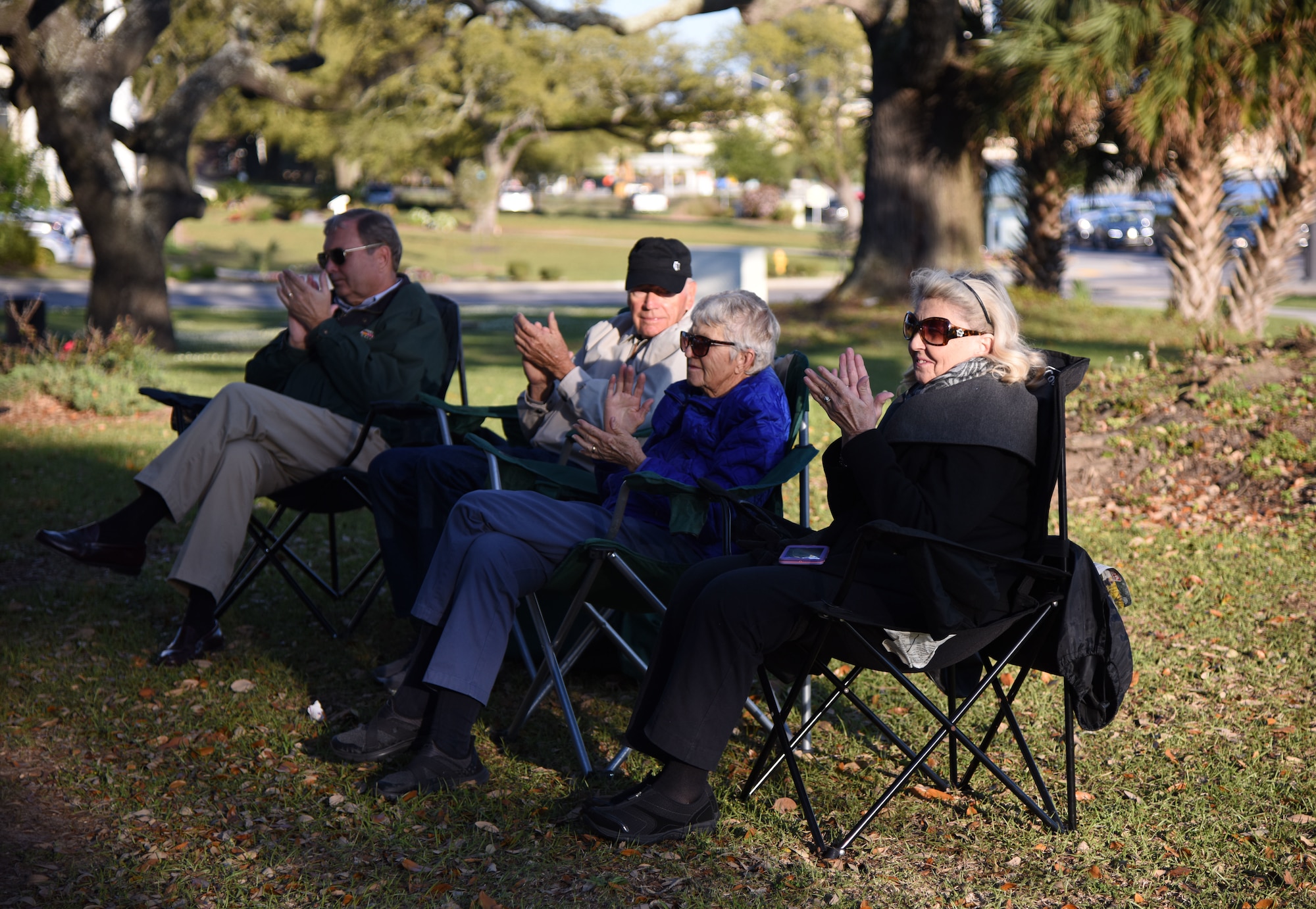 Audience members give a round-of-applause for the U.S. Army 41st Army Band’s performance at the Biloxi Lighthouse Park Pavilion March 13, 2018, in Biloxi, Mississippi. The band has been providing musical support and entertainment for over 50 years. They also performed at the White House Hotel, in Biloxi, Mississippi, and at the Vandenberg Commons on Keesler Air Force Base, Mississippi. (U.S. Air Force photo by Kemberly Groue)