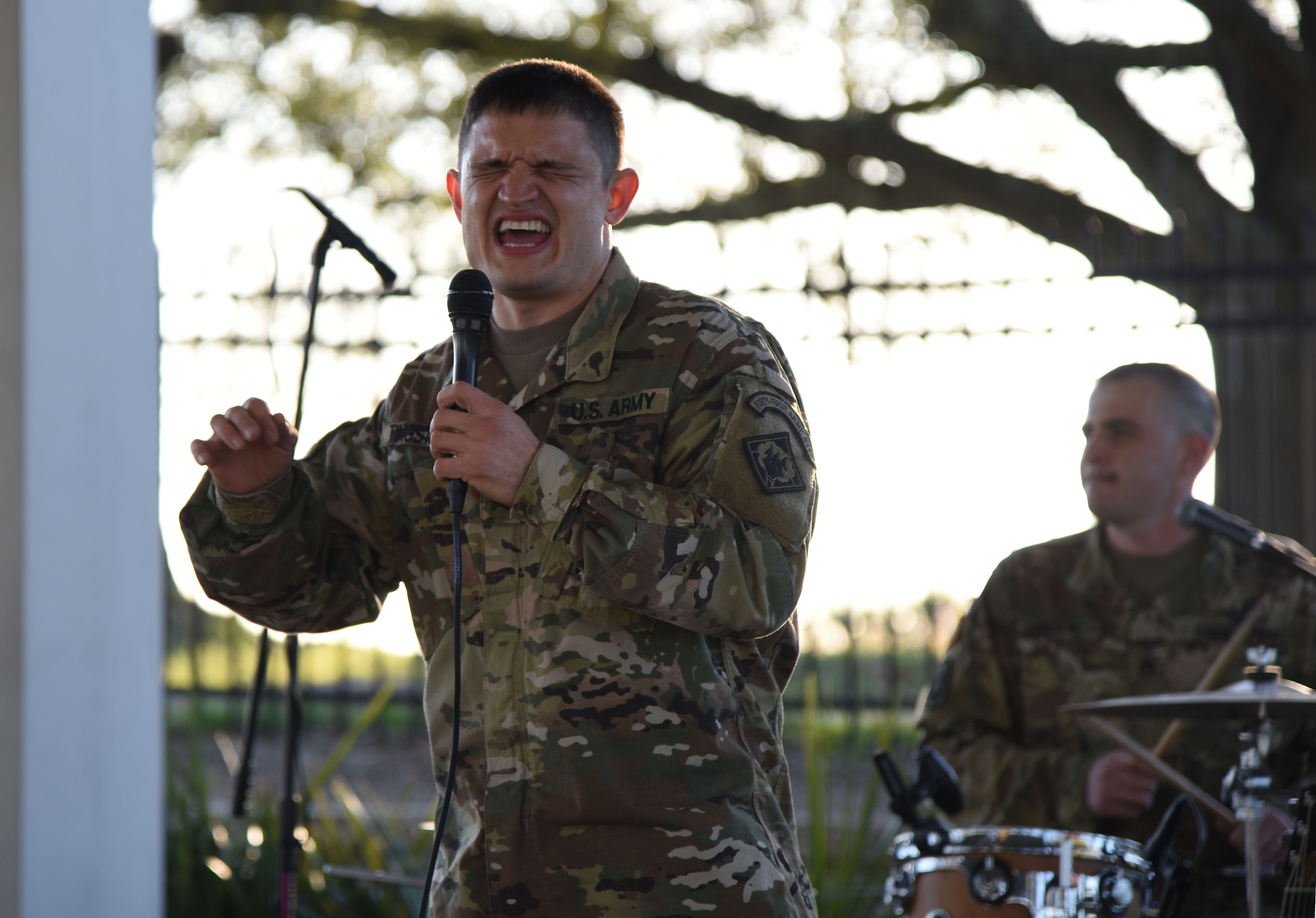 U.S. Army Sergeant Brandon Tingstrom, U.S. Army 41st Army Band vocalist and musical ambassador, Mississippi Air National Guard, Jackson, Mississippi, performs at the Biloxi Lighthouse Park Pavilion March 13, 2018, in Biloxi, Mississippi. The band has been providing musical support and entertainment for over 50 years. They also performed at the White House Hotel, in Biloxi, Mississippi, and at the Vandenberg Commons on Keesler Air Force Base, Mississippi. (U.S. Air Force photo by Kemberly Groue)