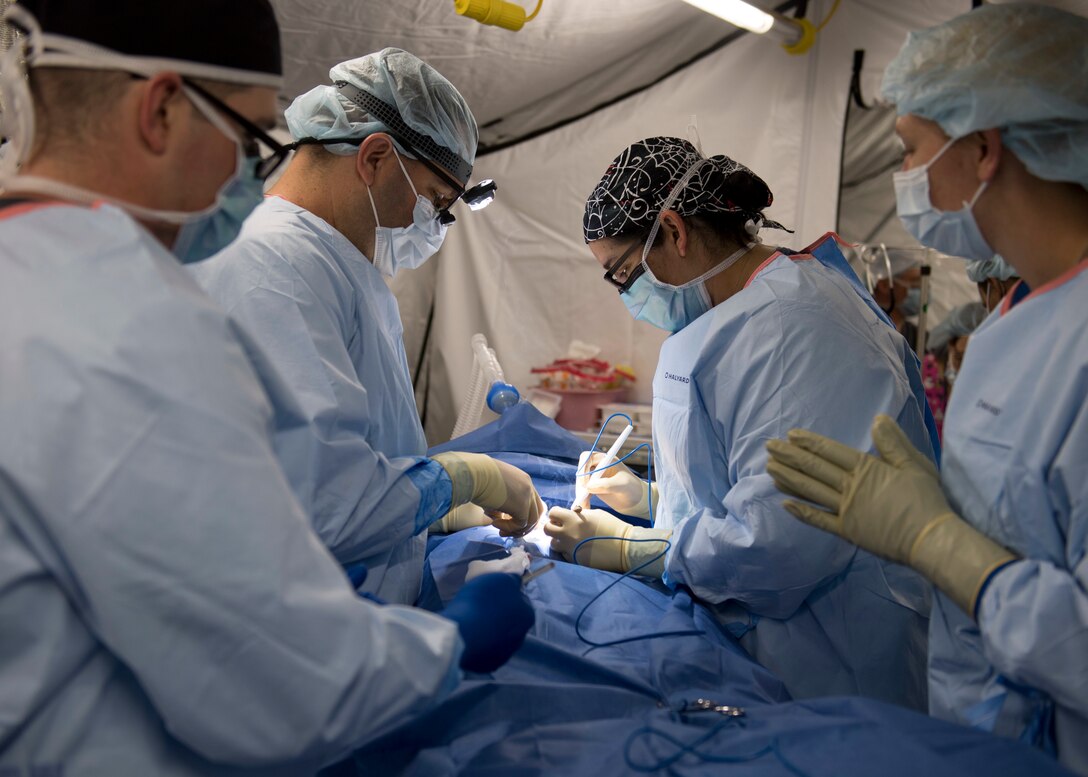 Navy doctors perform surgery