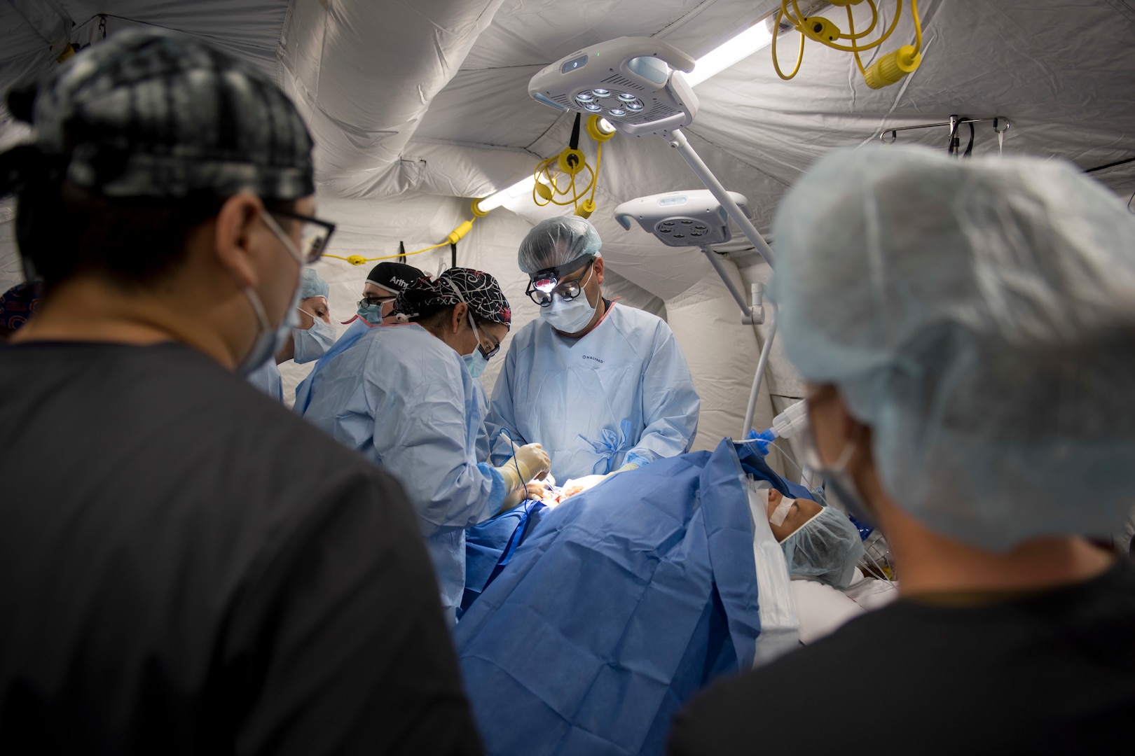 Navy doctors perform surgery