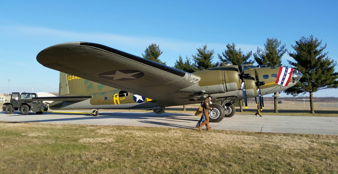 (03/14/2018) -- The B-17F Memphis Belle moves along the tow path toward the WWII Gallery at the National Museum of the United States Air Force on March 14, 2018. Plans call for the aircraft to be placed on permanent public display in the WWII Gallery here at the National Museum of the U.S. Air Force on May 17, 2018. (U.S. Air Force photo by Robert Bardua)
