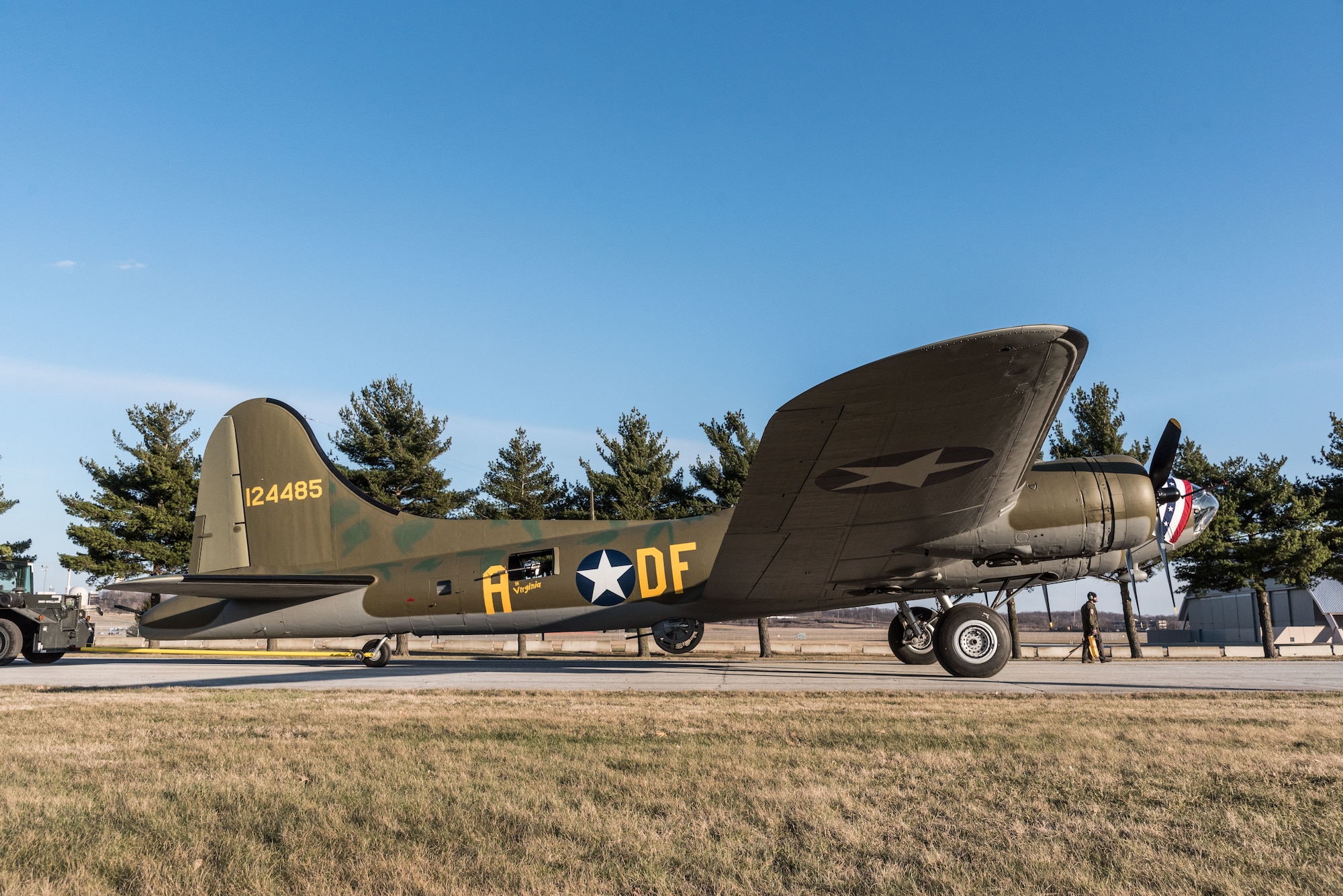 (03/14/2018) -- The B-17F Memphis Belle moves along the tow path on the way to the WWII Gallery at the National Museum of the United States Air Force on March 14, 2018. Plans call for the aircraft to be placed on permanent public display in the WWII Gallery here at the National Museum of the U.S. Air Force on May 17, 2018. (U.S. Air Force photo by Kevin Lush)
