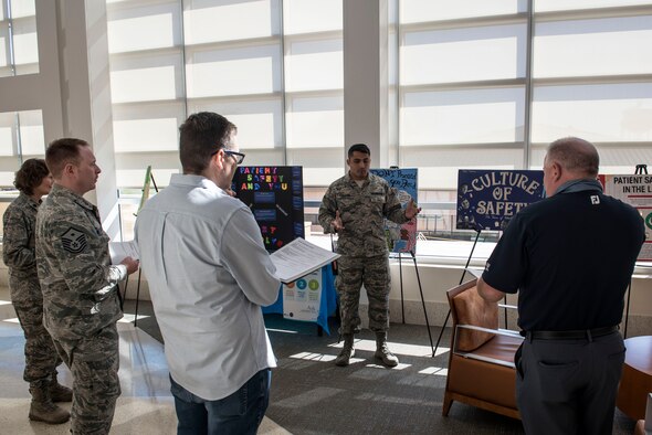 A U.S. Airman present his unit’s safety poster to a panel of judges at Shaw Air Force Base, S.C., March 15, 2018.