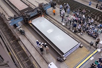 A 35-ton steel plate is displayed at Newport News Shipbuilding division during a ceremony to start advance construction of the aircraft carrier Enterprise (CVN 80).
