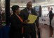 Cassandra Horne, 633rd Force Support Squadron human resource assistant, talks to Malcolm Reynolds, former U.S. Navy fire controlman second class, during a job fair at the Fort Eustis Club on Joint Base Langley-Eustis, Virginia, March 15, 2018.