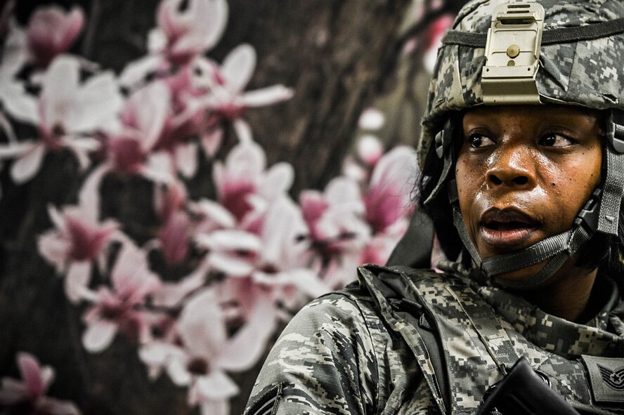 U.S. Air Force Tech. Sgt. Cecy Hunter, 20th Security Forces Squadron flight chief, takes a breath during an active threat exercise at Shaw Air Force Base, S.C., March 16, 2018.