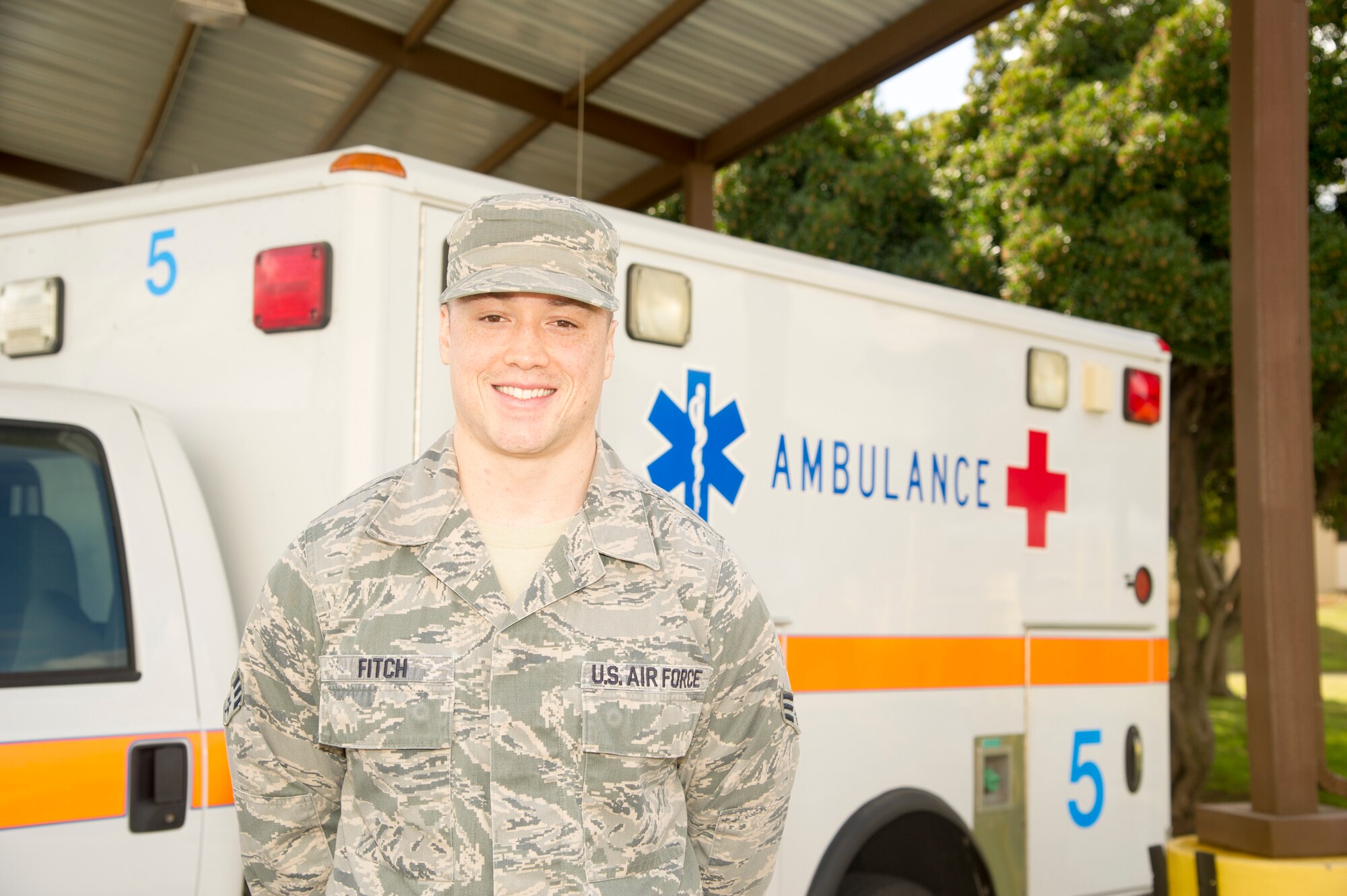 Senior Airman Brandon J. Fitch, 940th AMDS aerospace medical technician, stands in front of an ambulance March 4 at Beale Air Force Base, California.