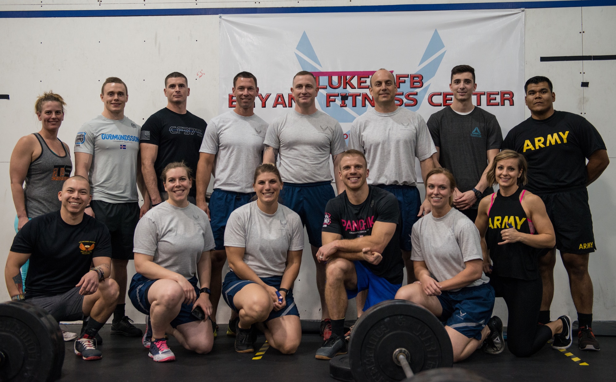 Competitors of the 2018 Reebok CrossFit Games Open 18.4 pose for a group photo at Luke Air Force Base, Ariz., March 15, 2018. The Crossfit Open allows competitors to register online and compete on their own or at local Crossfit boxes. (U.S. Air Force photo by Airman 1st Class Alexander Cook)