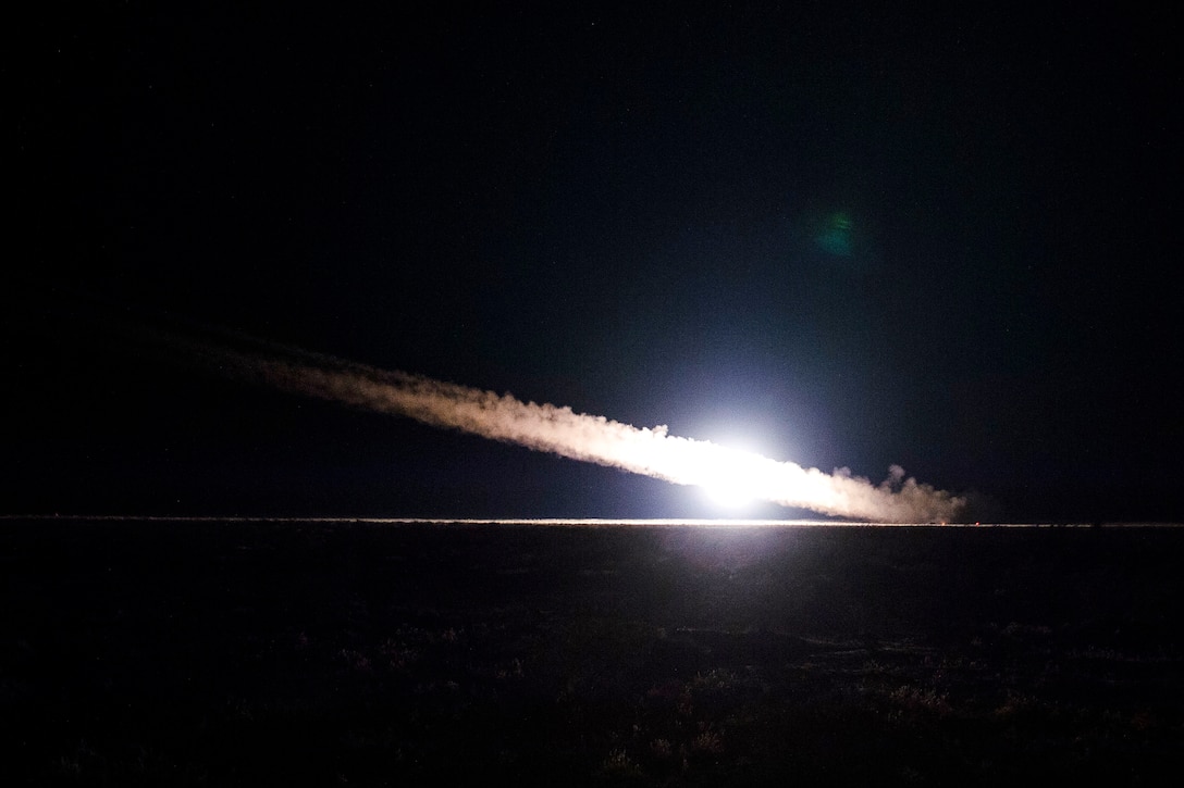 Marines fire a high-mobility artillery rocket.