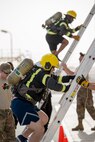 Members of the 379th Air Expeditionary Wing and Qatar Emiri Air Force participate in a firefighter challenge exercise at Al Udeid Air Base, Qatar, March 8, 2018. The a exercise, a strenuous course designed to test physical fitness and fire response capabilities, was organized by firefighters from the 379th ECES and Qatar Emiri Air Force. (U.S. Air Force photo by Staff Sgt. Joshua Horton)