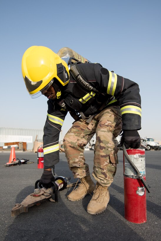Members of the 379th Air Expeditionary Wing and Qatar Emiri Air Force participate in a firefighter challenge exercise at Al Udeid Air Base, Qatar, March 8, 2018. The a exercise, a strenuous course designed to test physical fitness and fire response capabilities, was organized by firefighters from the 379th ECES and Qatar Emiri Air Force. (U.S. Air Force photo by Staff Sgt. Joshua Horton)