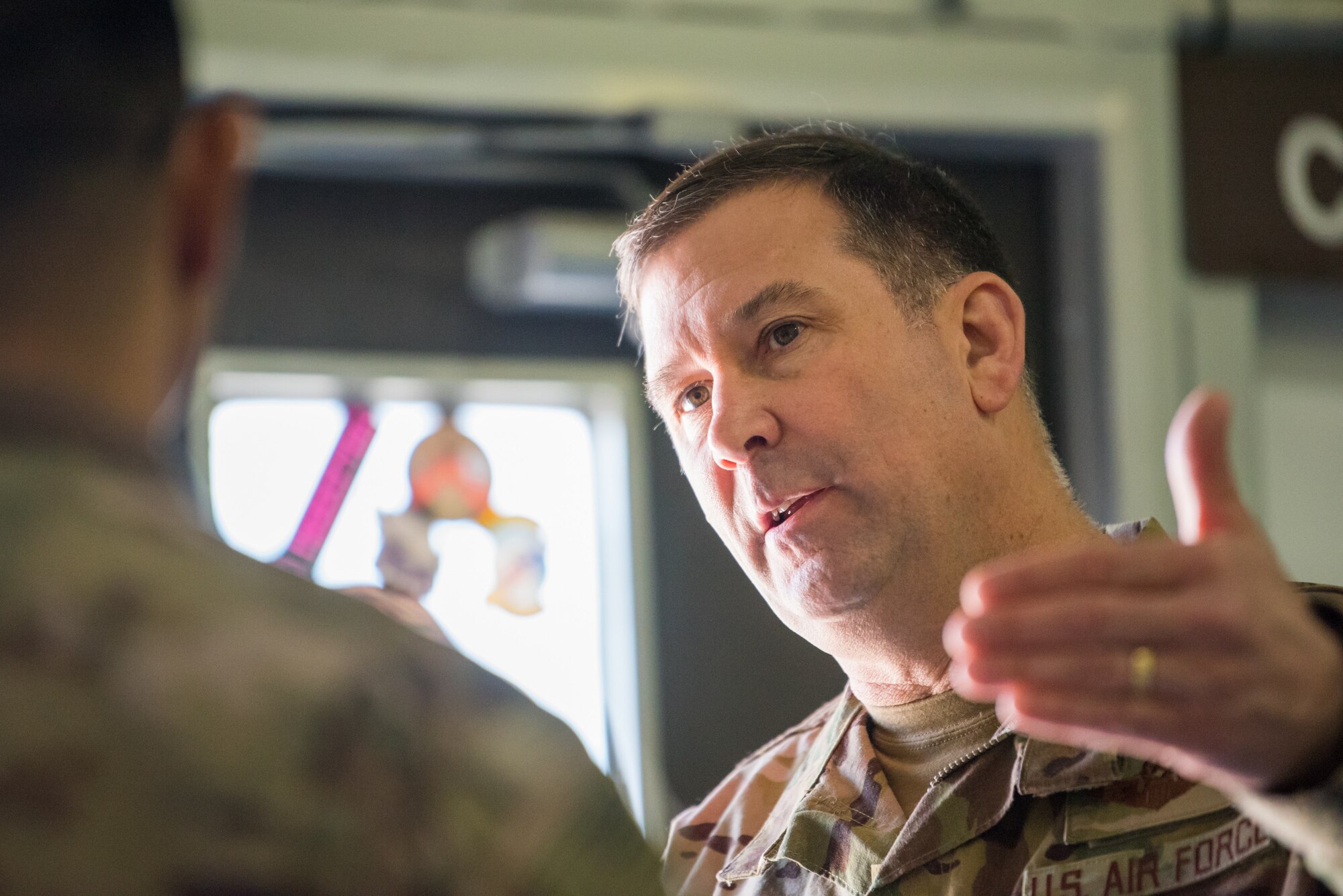 Maj. Gen. Christopher J. Bence, commander of the U.S. Air Force Expeditionary Center, tours the facilities of the 8th Expeditionary Air Mobility Squadron at Al Udeid Air Base, Qatar, March 4, 2018. The visit, part of a nine-day tour of various components of the 521st Air Mobility Operations Wing, provided Bence an opportunity to see the day-to-day operations of the 8 EAMS, observe how they complete their mission, and commemorate a few selected Airmen for their outstanding performance. (U.S. Air Force photo by Staff Sgt. Joshua Horton)