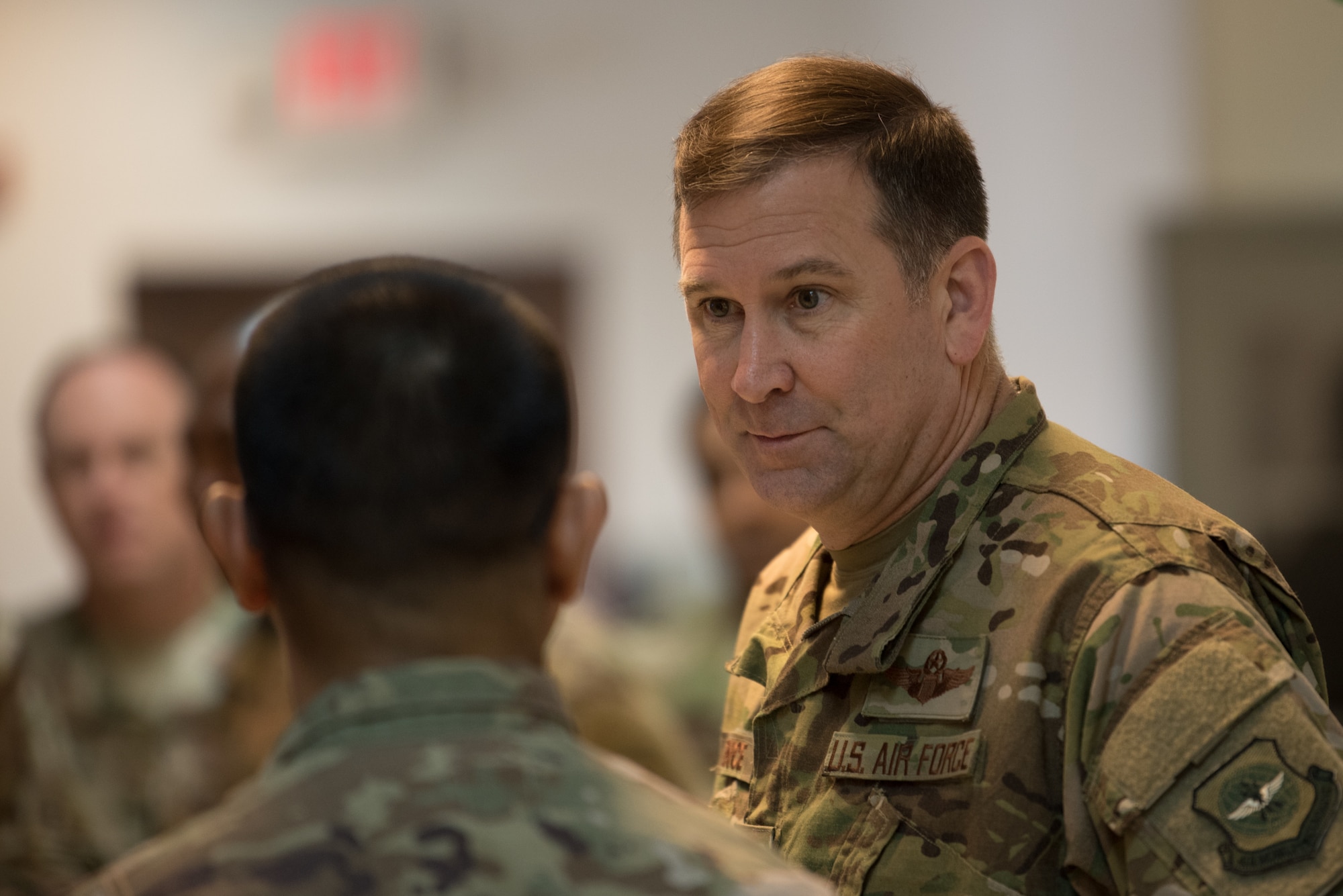Maj. Gen. Christopher J. Bence, commander of the U.S. Air Force Expeditionary Center, tours the facilities of the 8th Expeditionary Air Mobility Squadron at Al Udeid Air Base, Qatar, March 4, 2018. The visit, part of a nine-day tour of various components of the 521st Air Mobility Operations Wing, provided Bence an opportunity to see the day-to-day operations of the 8 EAMS, observe how they complete their mission, and commemorate a few selected Airmen for their outstanding performance. (U.S. Air Force photo by Staff Sgt. Joshua Horton)