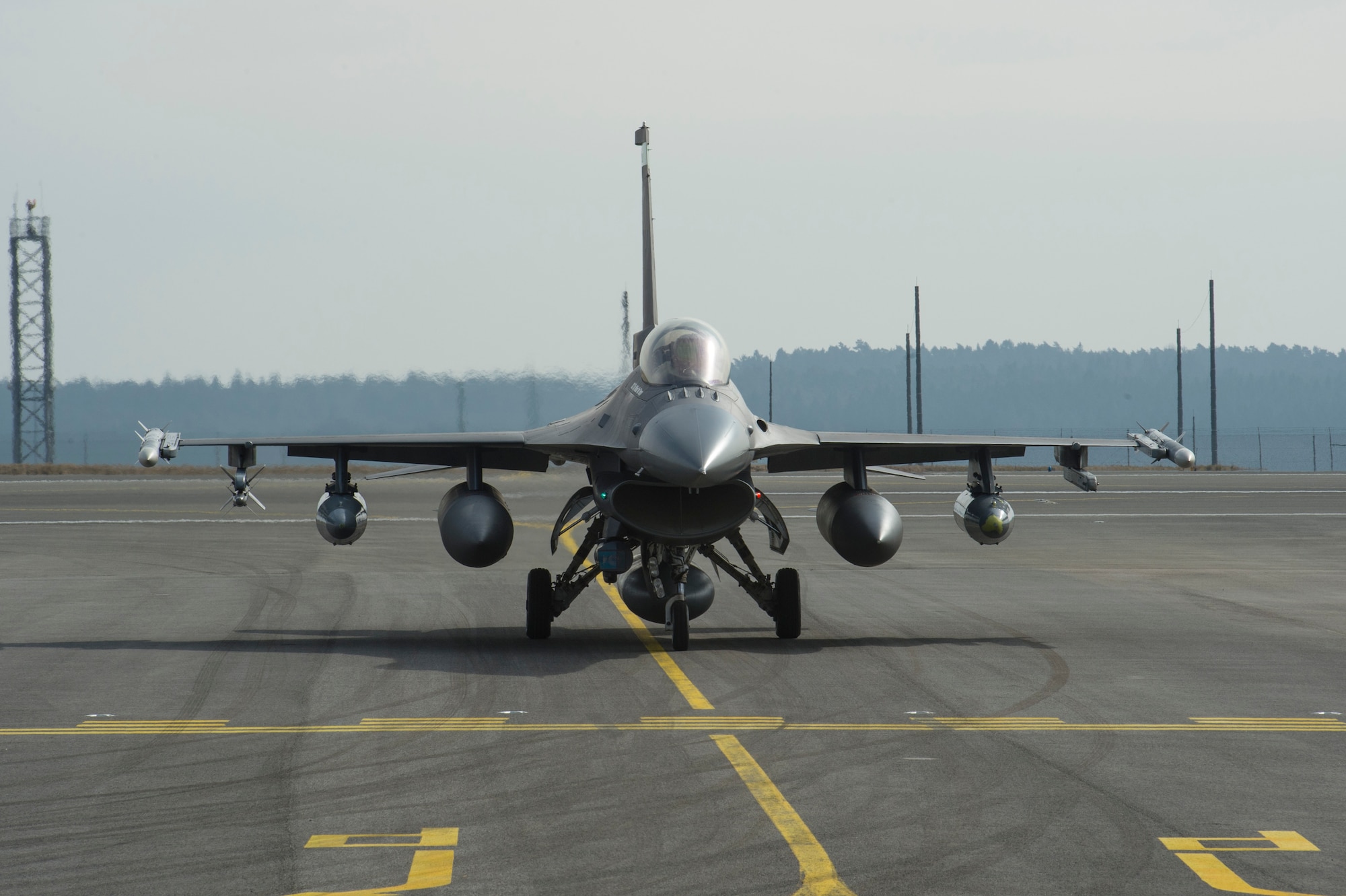 A U.S. F-16 Fighting Falcon assigned to the 112th Expeditionary Fighter Squadron, from the 180th Fighter Wing, Ohio Air National Guard, lands at Spangdahlem Air Base, Germany, March. 6, 2018. The 112th EFS arrived at Spangdahlem to support a base-wide exercise to increase the capability and readiness of U.S. forces, allowing for a faster response in the event of any aggression by any adversary against NATO sovereign territory. (U.S. Air Force photo by Senior Airman Dawn M. Weber)