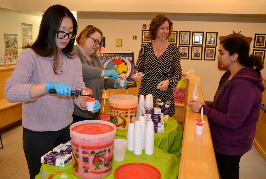 Members of the DLA Troop Support’s Medical Culture Improvement Team hand out water ice during a pep rally at DLA Troop Support in Philadelphia, March 14, 2018.