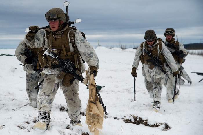 Marines with Kilo Company, 3rd Battalion, 8th Marine Regiment, conduct a joint live-fire training exercise at Fort Greely, Alaska, as part of the U.S. Army Alaska-led Joint Force Land Component Command in support of Alaskan Command’s exercise Arctic Edge 18 conducted under the authority of U.S. Northern Command, March 15, 2018. Air Force photo by Capt. Virginia Lang
