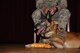 Astra, 20th Security Forces Squadron military working dog (MWD), guards her bone during an MWD retirement ceremony at Shaw Air Force Base, S.C., March 14, 2018.
