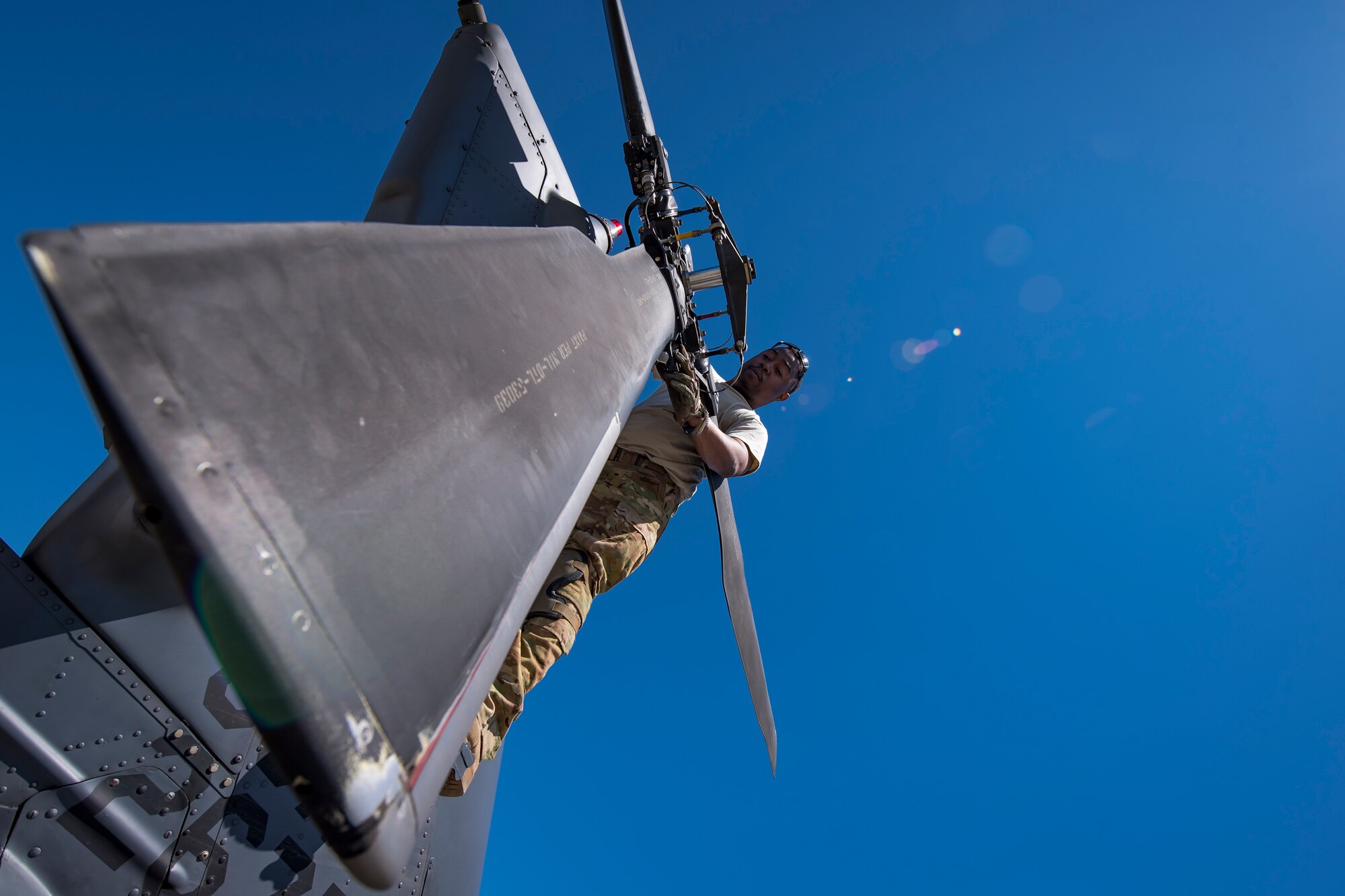 Senior Airman Latrell Solomon, 41st Rescue Squadron (RQS) special missions aviator, inspects the rear propeller of an HH-60G Pave Hawk, March 15, 2018, at Moody Air Force Base, Ga.  Airmen from the 41st RQS and 723d Aircraft Maintenance Squadron conducted pre-flight checks to ensure that an HH-60G Pave Hawk was fully prepared for a simulated combat search and rescue mission. (U.S. Air Force photo by Airman Eugene Oliver)