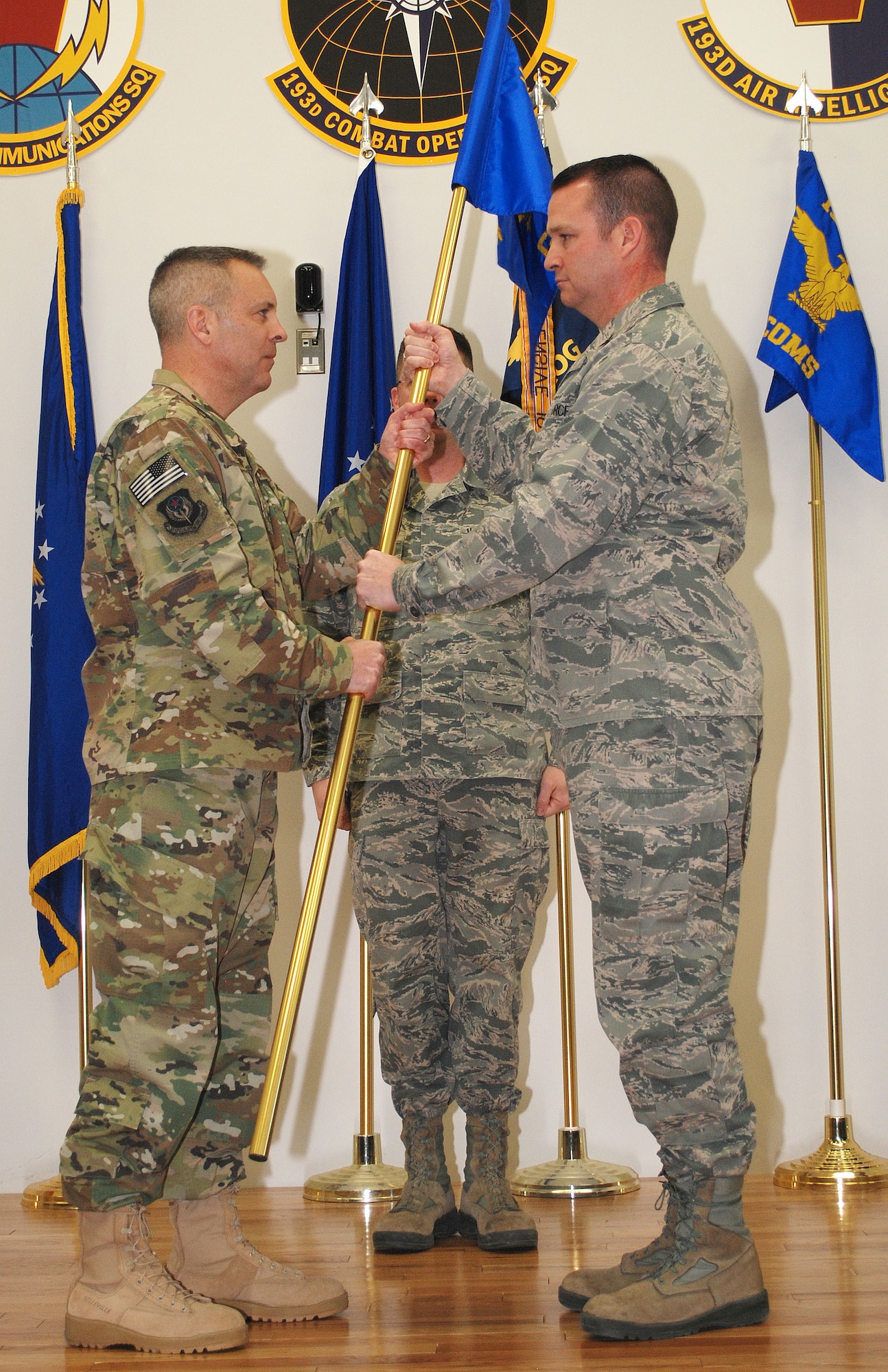 Col. Adam Marshall (right) assumed command of the 193rd Combat Operations Squadron, State College, Pennsylvania, during an assumption of command ceremony held at the unit March 11.