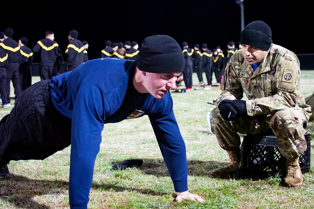 A soldier performs pushups.