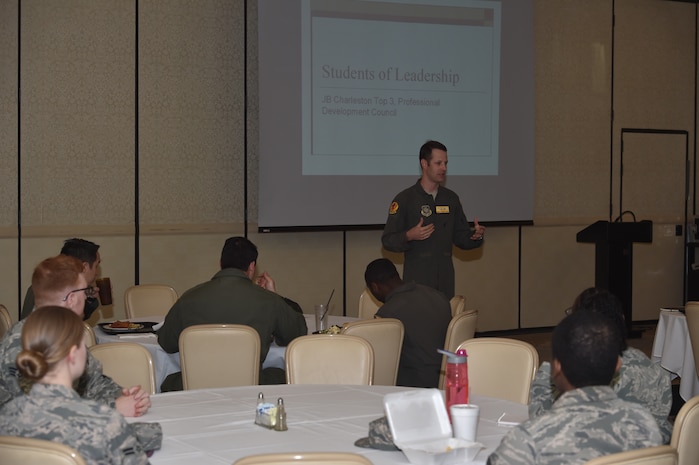 Master Sgt. Danny South, 16th Airlift Squadron loadmaster superintendent guides a conversation during the inaugural Students of Leadership Seminar in the Charleston Club here, March 15, 2018.