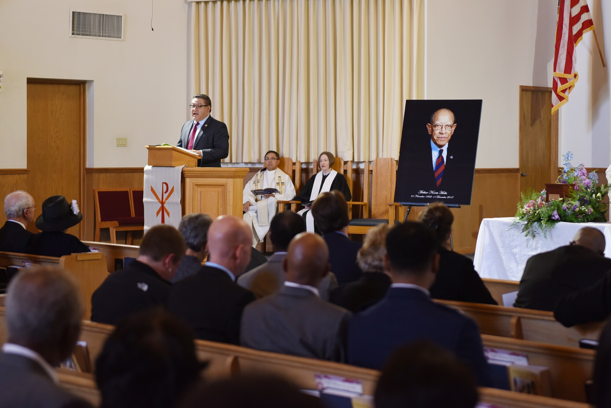 U.S. Congress Rep. Salud Carbajal, 24th District, speaks during Chief Master Sgt. Arthur Norris Hicks’ memorial service at the base chapel, March 17, 2018, Vandenberg Air Force Base, Calif. Hicks served with the Tuskegee Airmen during World War II and worked as an educator and human rights advocate. (U.S. Air Force photo by Tech. Sgt. Jim Araos/Released)
