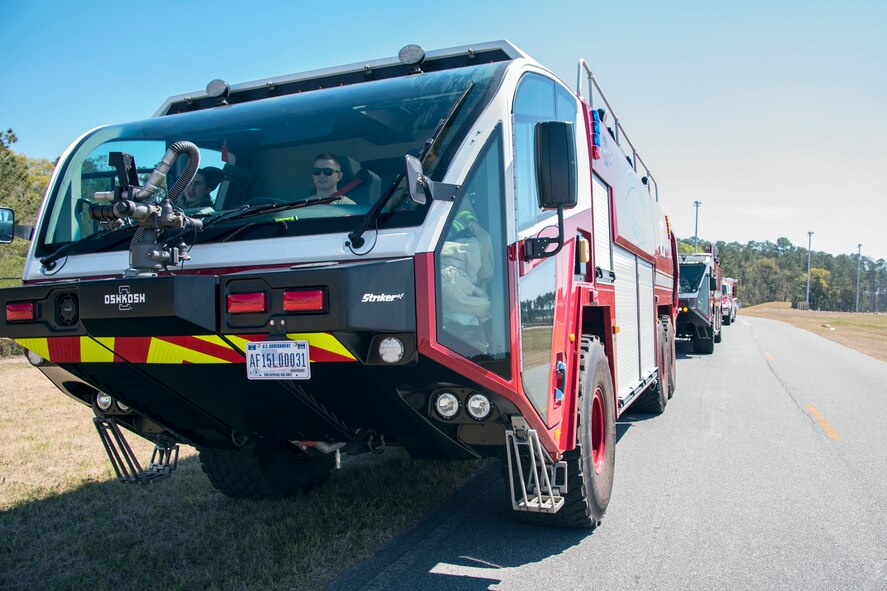 Aircraft rescue firefighting vehicles from the 23d Civil Engineer Squadron (CES) sit in a line prior to a live-fire burn exercise, March 16, 2018, at Moody Air Force Base, Ga.  Firefighters from the 23d CES conducted the exercise to demonstrate their firefighting capabilities to community leaders and Moody’s honorary commanders. (U.S. Air Force photo by Airman Eugene Oliver)