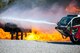 Water shoots from the hose of an Aircraft rescue firefighting vehicle onto a fire during a live-fire burn exercise, March 16, 2018, at Moody Air Force Base, Ga.Firefighters from the 23d CES conducted the exercise to demonstrate their firefighting capabilities to community leaders and Moody’s honorary commanders. (U.S. Air Force photo by Airman Eugene Oliver)