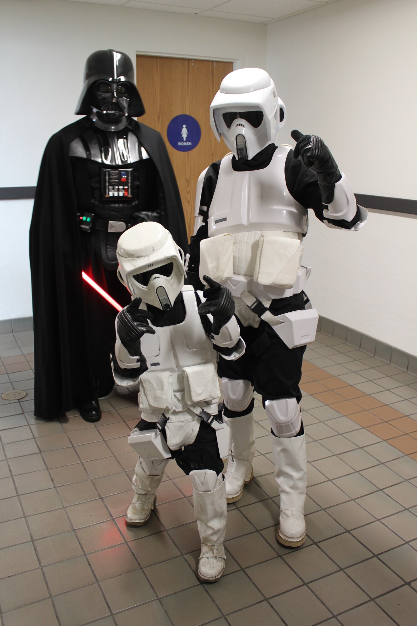The 412th Mission Support Group invited the 501st Legion to help with the grand reopening of the base theater March 16. According to their website, the legion is a volunteer organization for “Star Wars” costume enthusiasts who promote interest in the franchise through the building and wearing of quality, accurate costumes, and participating in community events. (Courtesy photo by Kayla Fagan)
