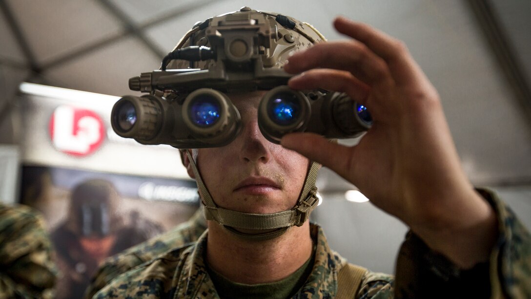 A Marine uses new night optics technology during an exercise.