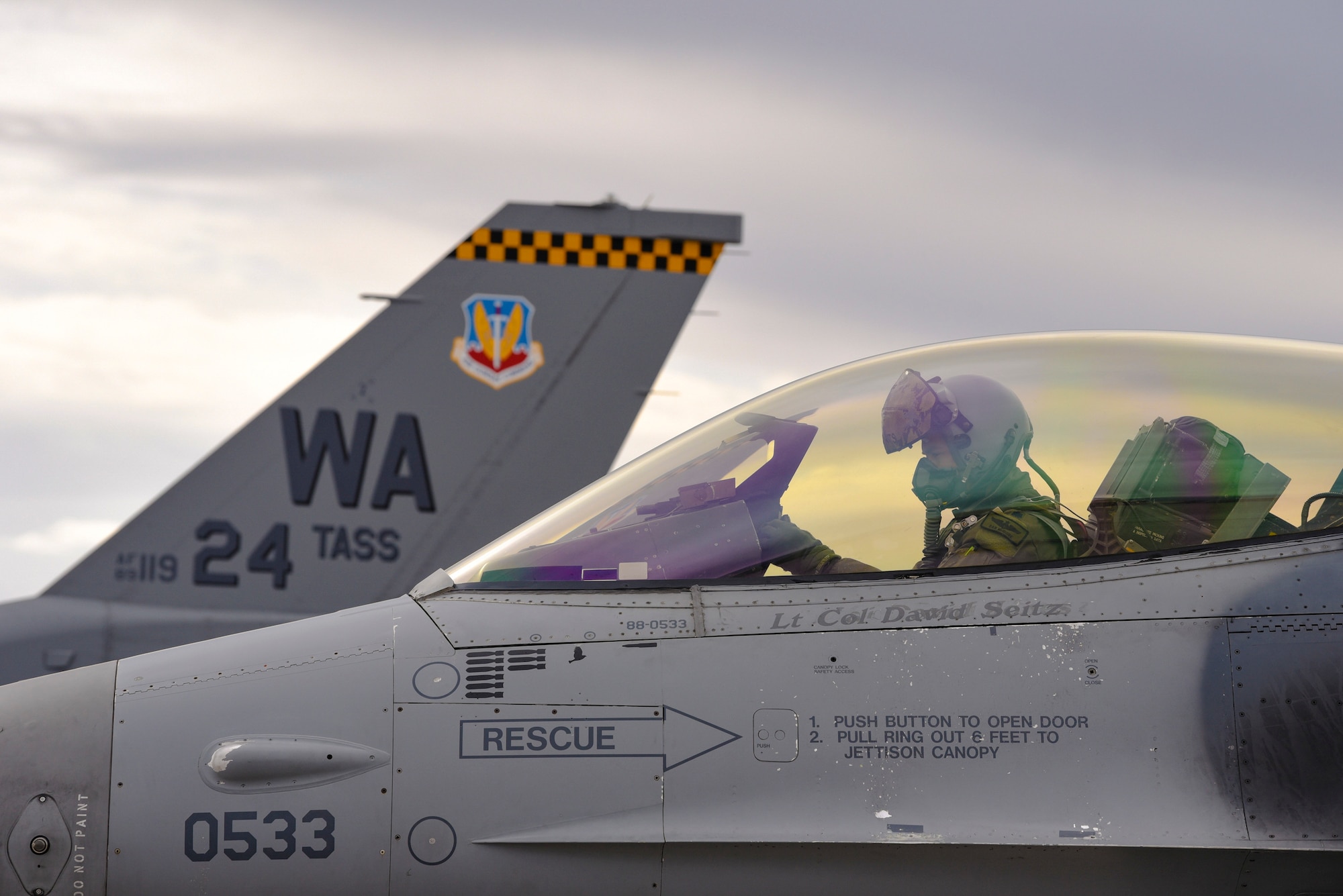 Lt. Col. Daniel McGuire, 57th Wing fighter pilot, sits in the cockpit of an F-16 Fighting Falcon fighter jet assigned to the 24th Tactical Air Support Squadron at Nellis Air Force Base, Nevada, Feb. 27, 2018. The 24th TASS will fly F-16s and focus solely on overcoming air-to-ground adversaries. (U.S. Air Force photo by Airman 1st Class Andrew D. Sarver)