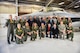 Members assigned to the 24th Tactical Air Support Squadron pose for the first squadron group photo at Nellis Air Force Base, Nevada, Mar. 2, 2018. The 24th TASS will fly F-16s and focus solely on overcoming air-to-ground adversaries. (U.S. Air Force photo by Lawrence Crespo)