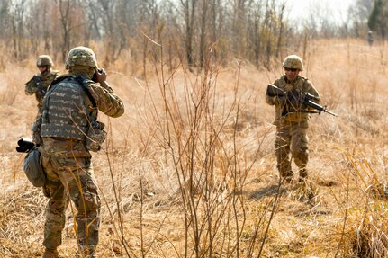 U.S. Army Reserve Spc. Torrance Saunders, a combat documentation/ production specialist with the 982nd Combat Camera Company (Airborne) maneuvers to photograph Soldiers during a react to contact battle drill during Combat Support Training Exercise (CSTX) at Fort Knox, Kentucky, March 15, 2018.