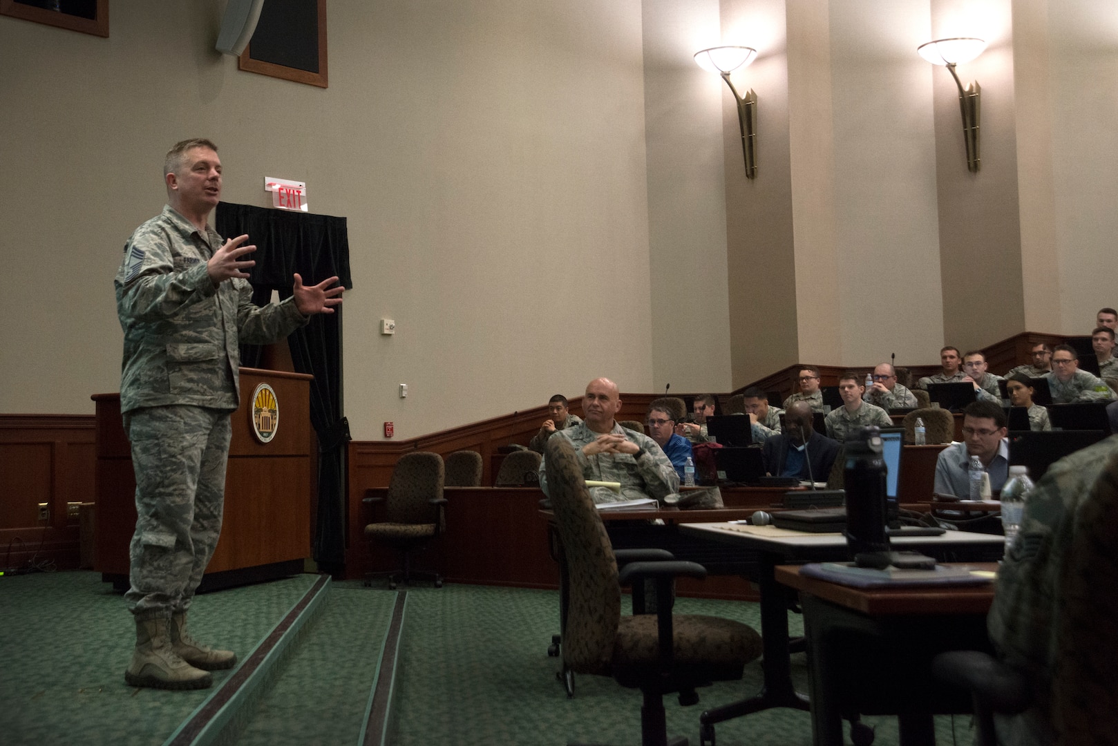 Chief Master Sergeant James Farmer, 690th Cyberspace Operations Group superintendent, answers questions during the Cybersecurity Foundry Course at MacDill Air Force Base, Fla., March 14, 2018. Course instructors taught 100 cyberspace students various cybersecurity functions, processes, procedures and data analysis skills to further their ability to secure the Air Force Network. (U.S. Air Force photo by Airman 1st Class Scott Warner)