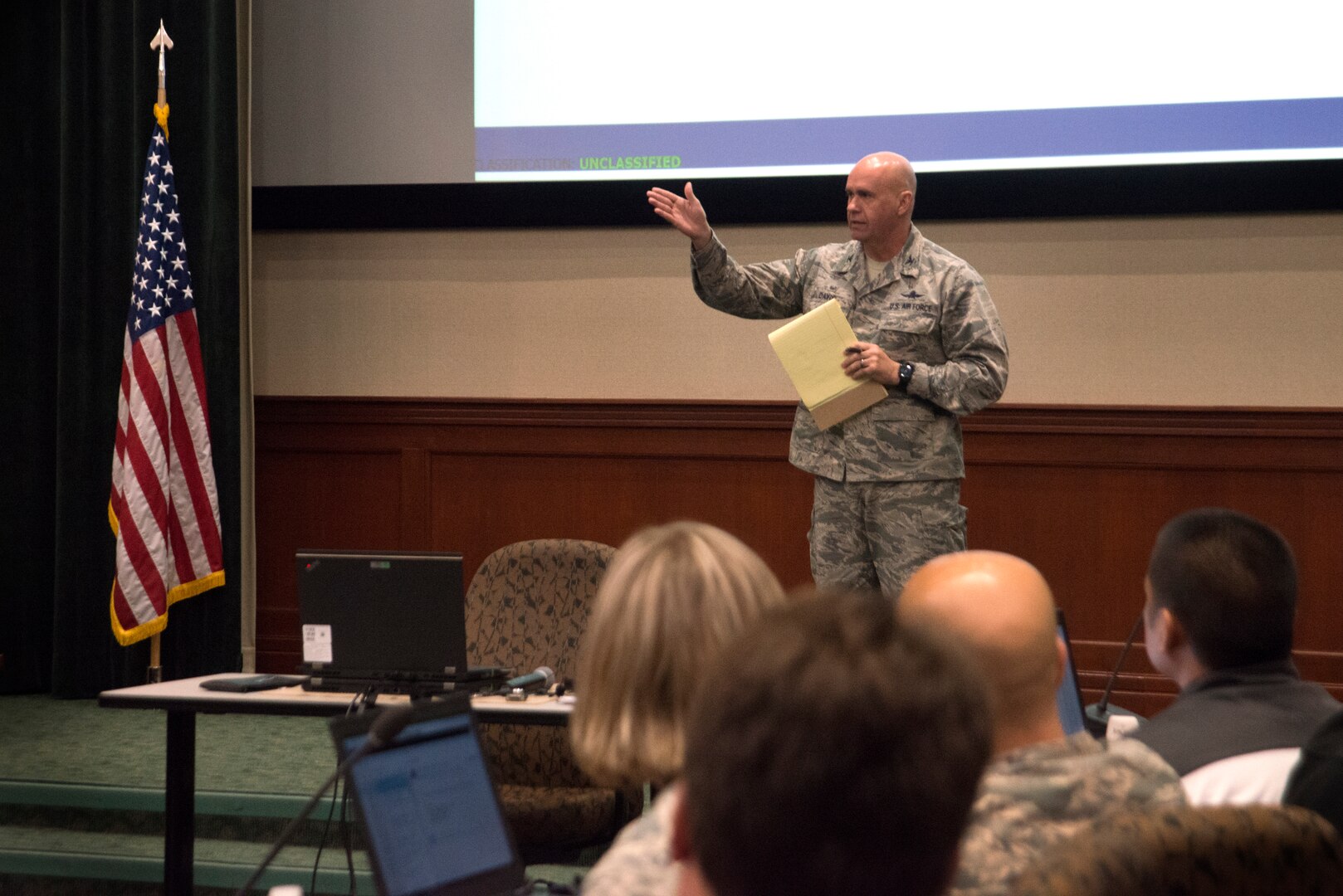 Col. Gregory Davis, 690th Cyberspace Operations Group commander, gives closing remarks at the inaugural Cybersecurity Foundry Course at MacDill Air Force Base, Fla., March 14, 2018. Course instructors taught 100 cyberspace students various cybersecurity functions, processes, procedures and data analysis skills to further their ability to secure the Air Force Network. (U.S. Air Force photo by Airman 1st Class Scott Warner)