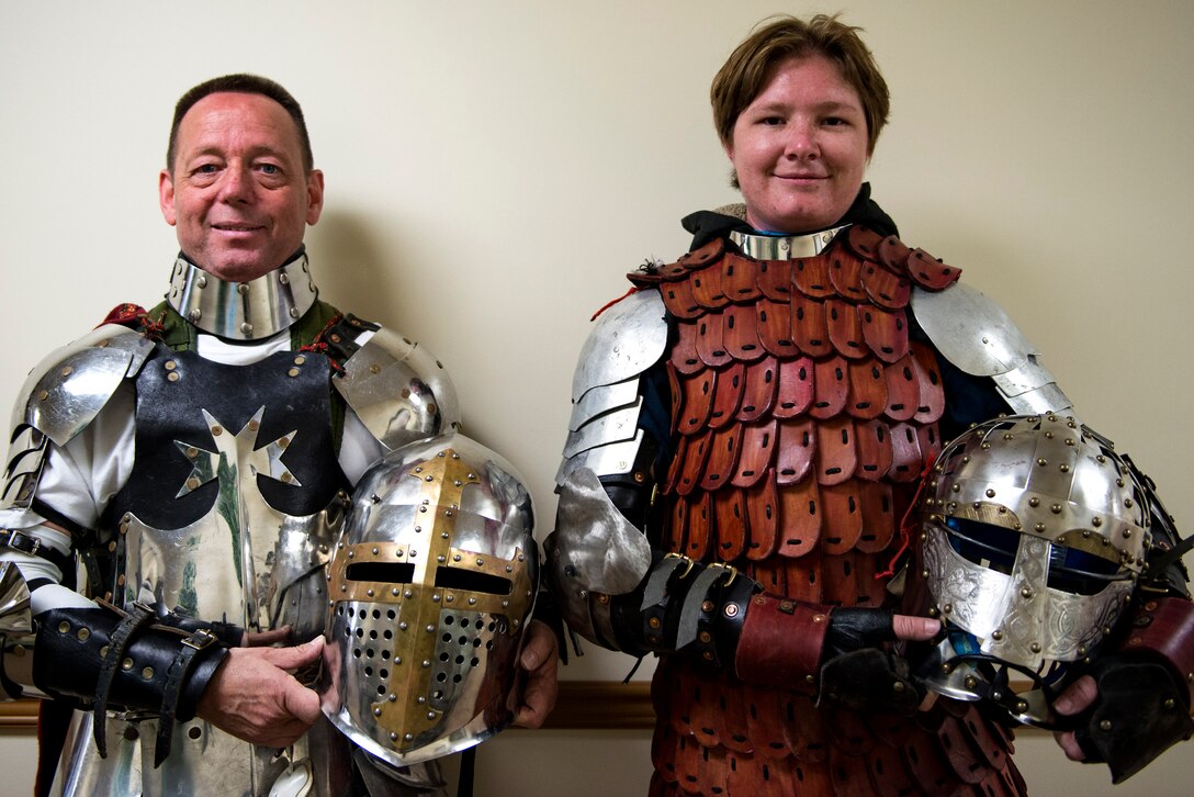 Charles Matthews, left, and Senior Airman Jennell Matthews, 723d Aircraft Maintenance Squadron support section journeyman, pose for a photo during Cub Con, a multi-genre entertainment convention, March 17, 2018, at Moody Air Force Base, Ga. The convention was held to spread awareness of the library’s new weekend hours as well as get people excited for Tiger Con, scheduled for April 14-15. (U.S. Air Force photo by Airman 1st Class Erick Requadt)