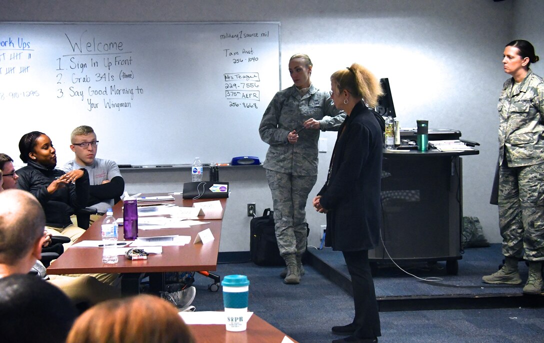 Sharing financial ideas important to success.At center, the Director of the 932nd Airlift Wing's Airman and Family Readiness Office, Deb Teague, along with recruiters Tech. Sgt. Brittany Paus and Master Sgt. Tabetha Coley, spoke to unit members about finances during a recent drill weekend at Scott Air Force Base, Ill. The topic was "Making the Most of Your Money", with a focus on budgeting, saving and the Thrift Savings Program (TSP) that is available to government civilians and military members. Those interested in attending future classes should call 932 Airman & Family Readiness at 229-7556 for more information. (U.S. Air Force photo by Lt. Col. Stan Paregien)