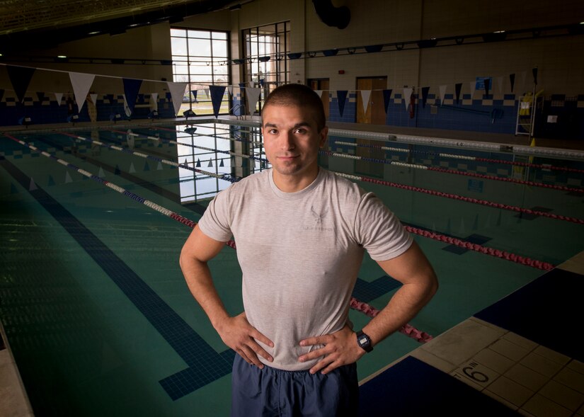 U.S. Air Force Staff Sgt. Michael Svoleantopoulos, 497th Operation Support Squadron weapons tactician, stands by the Shellbank Fitness Center’s pool at Joint Base Langley-Eustis, Virginia, March 14, 2018.