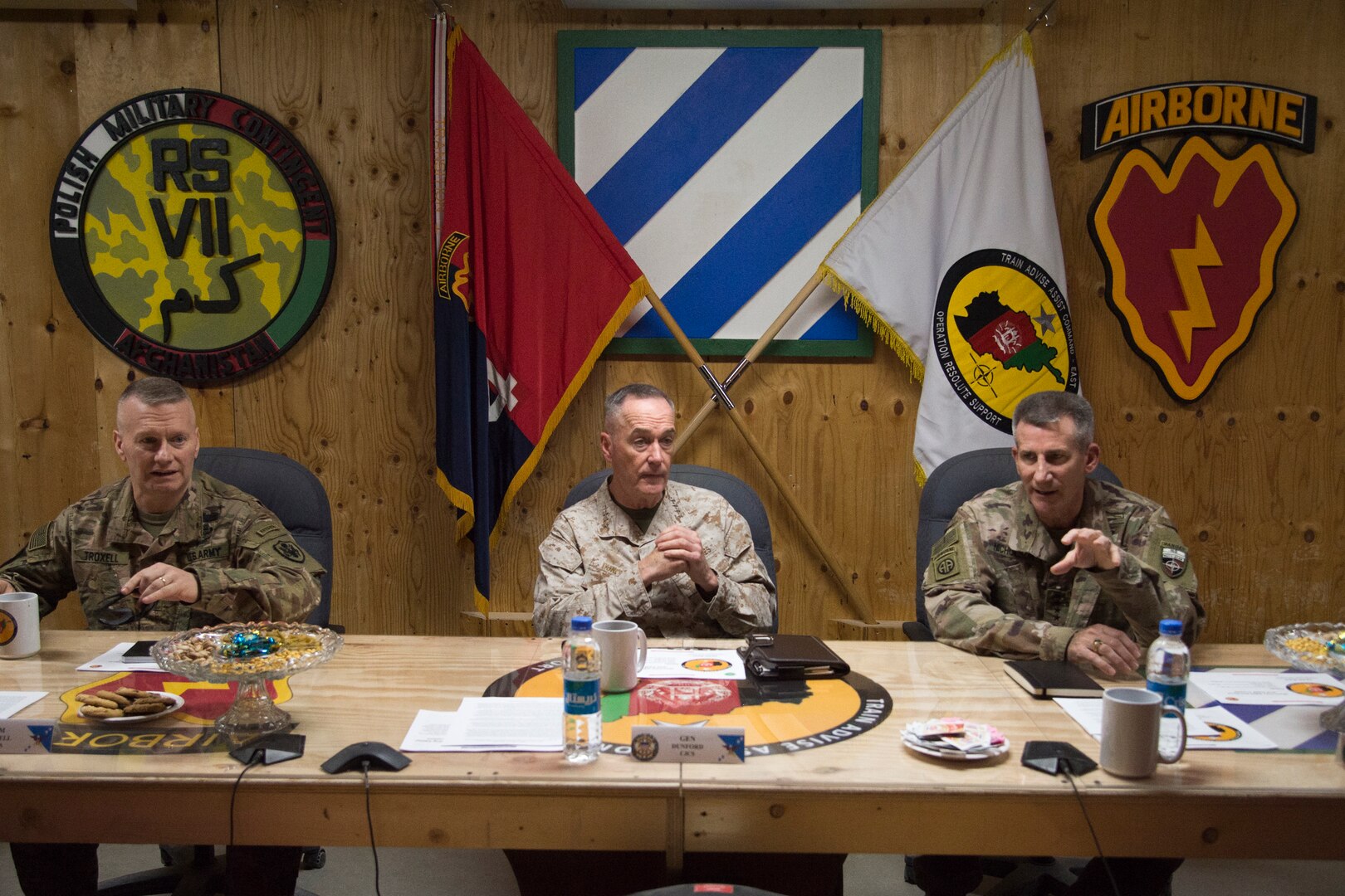 Marine Corps Gen. Joe Dunford, chairman of the Joint Chiefs of Staff, and Army Gen. John W. Nicholson Jr., commander, Resolute Support Mission and U.S. Forces Afghanistan, have a roundtable discussion with members of Train Advise Assist Command - East at Forward Operating Base Gamberi, March 21, 2018.