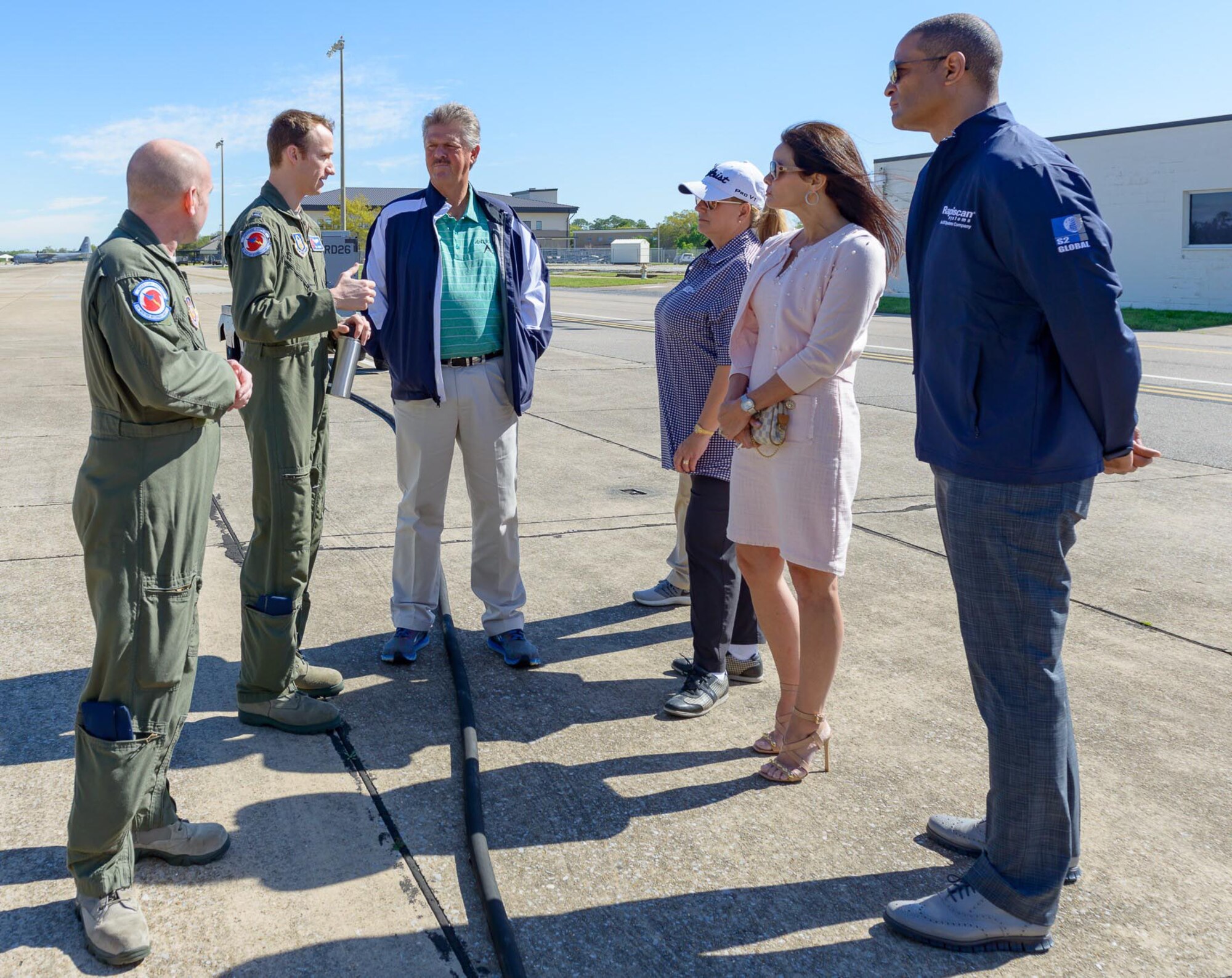Capt. Will Simmons, 53rd Weather Reconnaissance Squadron pilot, briefs Professional Golf Association Tour Champion Players Willie Wood and Jaydon Blake about the Hurricane Hunter mission during a tour of Keesler Air Force Base, Miss., March 20. Wood and Blake are playing in the Rapiscan Systems Classic PGA Golf Tournament March 19 to 25, 2018. (U.S. Air Force photo by André Askew)