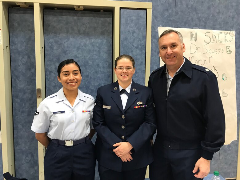 655th Intelligence, Surveillance and Reconnaissance Group, 50th Intelligence Squadron Acting Commander Lt. Col. Jason Markiewitz and two Airmen from the 9th Intelligence Squadron brought their technical and military expertise to the Bridge Street School Career Exploration Night event in Yuba City, California, February 20, 2018.
