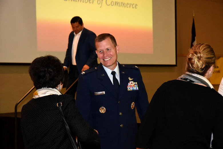 U.S. Air Force Col. Jeffrey Sorrell, 17th Training Wing vice commander, converses with members of the San Angelo chamber of commerce after giving a speech at the McNease Convention Center in San Angelo, Texas, March 20, 2018. The focus of the event was the positive impact of Goodfellow and San Angelo working together (U.S. Air Force photo by Airman 1st Class Seraiah Hines/Released)