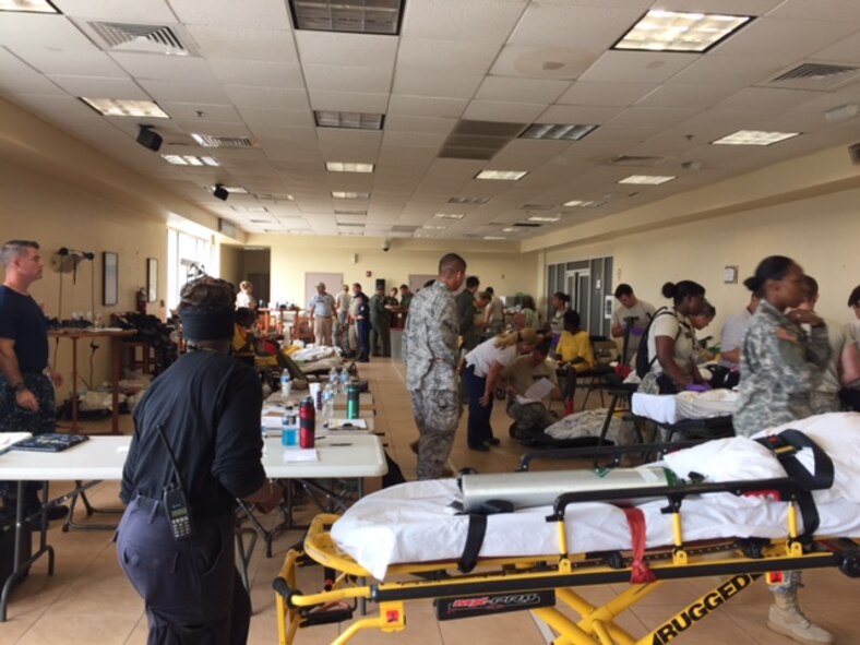 Members of a U.S. Air Force En Route Patient Staging System team from the 375th Medical Group based at Scott Air Force Base set up an aeromedical staging location for Hurricane Maria relief efforts on Sept. 23, 2017, after arriving at Henry E. Rohlsen Airport, near Christiansted on St. Croix, U.S. Virgin Islands. (Photo by Lt. Col. Elizabeth Anderson-Doze)