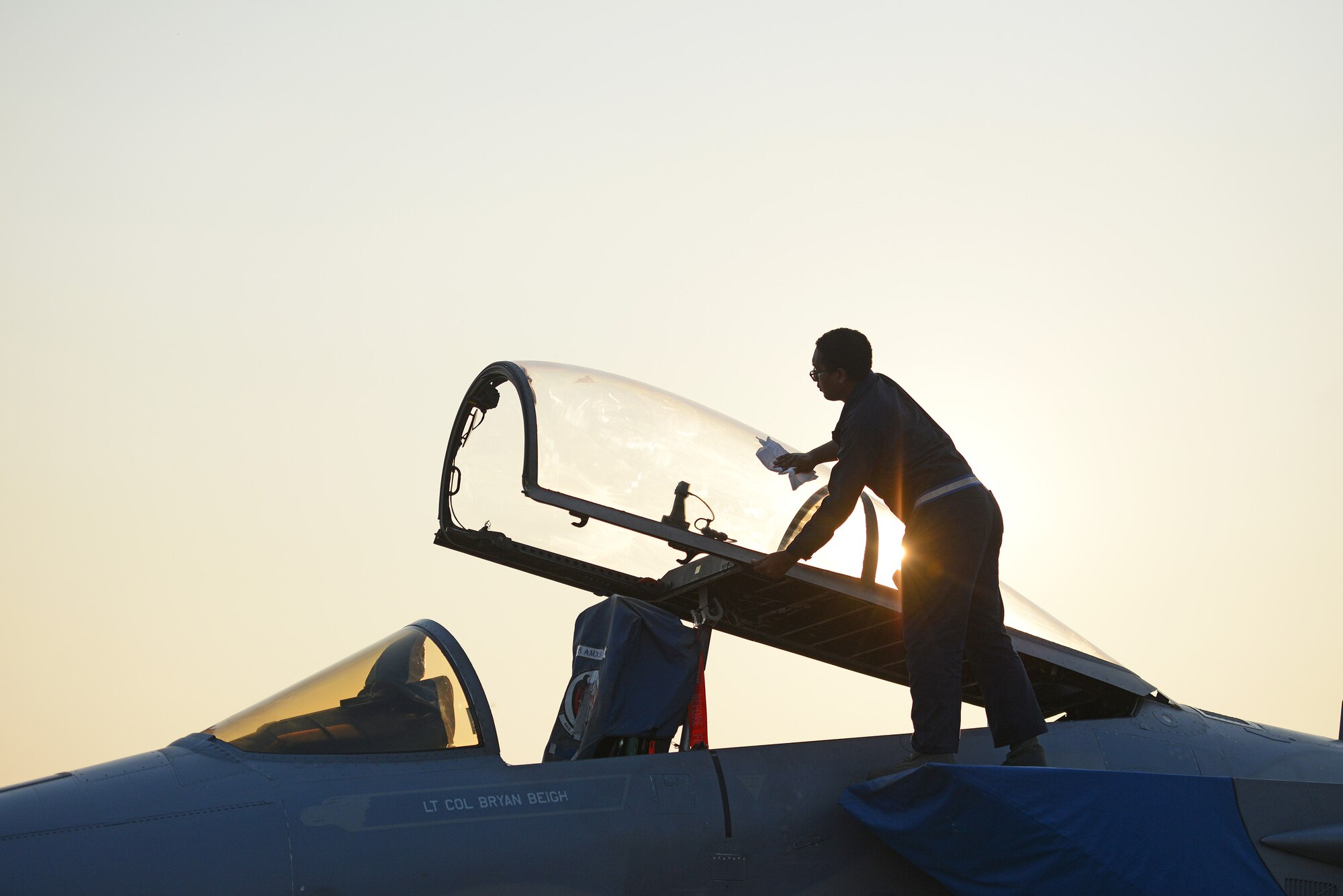 U.S. Air Force Airman 1st Class Allen Shipman, an F-15C Eagle crew chief from the 44th Fighter Squadron, Kadena Air Base, Japan, cleans a canapoy during COPE TIGER 2018 at Korat Air Base, Thailand, March 20, 2018.