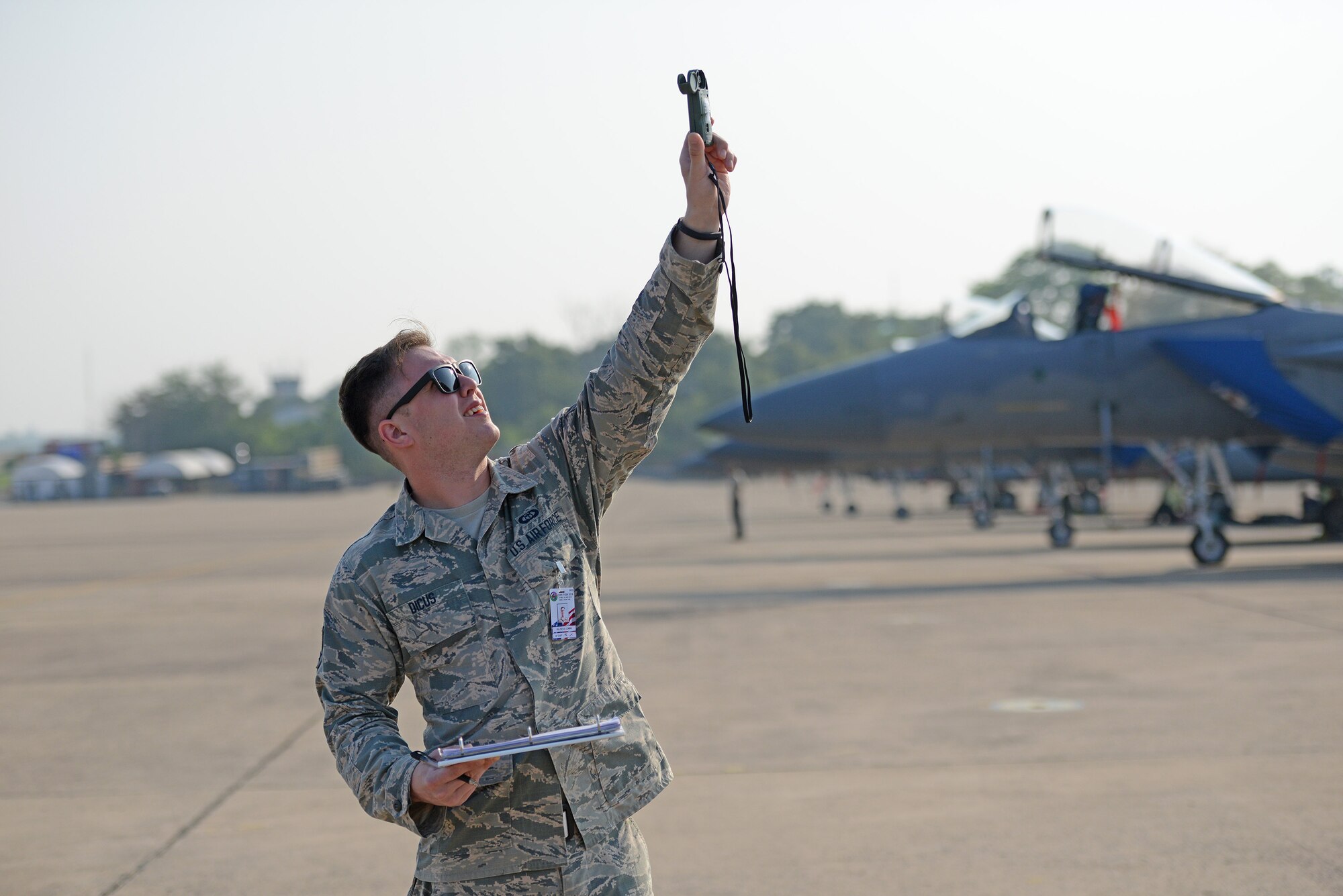 U.S. Air Force Senior Airman Corbin Dicus, a weather forecaster with the 18th Operations Support Squadron, Kadena Air Base, collect weather data during COPE TIGER 2018 from Korat Air Base, Thailand, March 20, 2018.