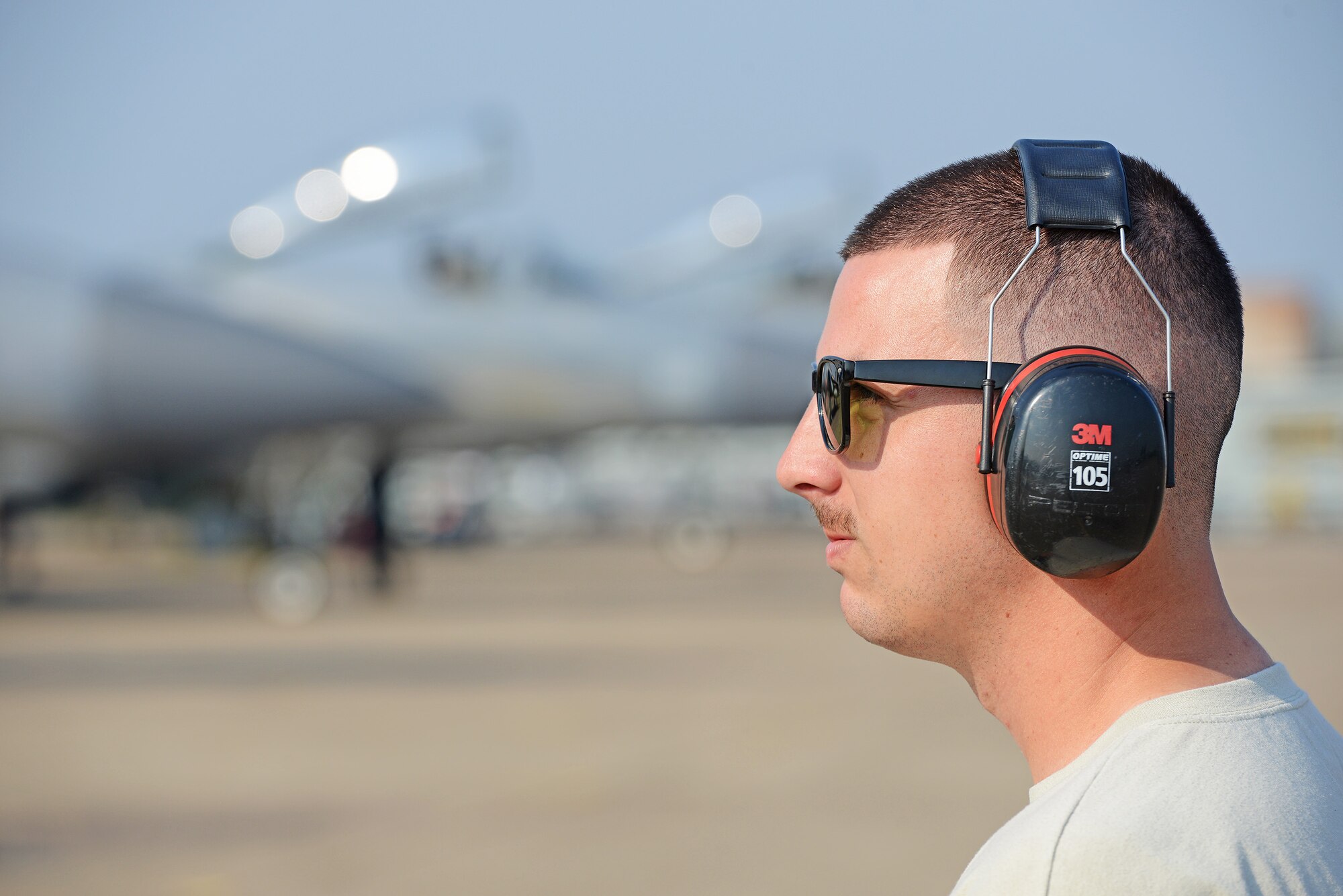 U.S. Air Force Staff Sgt. Ian Swartzwelder, a weapons load crew tram chief with the 44th Fighter Squadron, Kadena Air Base, Japan, overserve flightline operations during COPE TIGER 2018 from Korat Air Base, Thailand, March 20, 2018.
