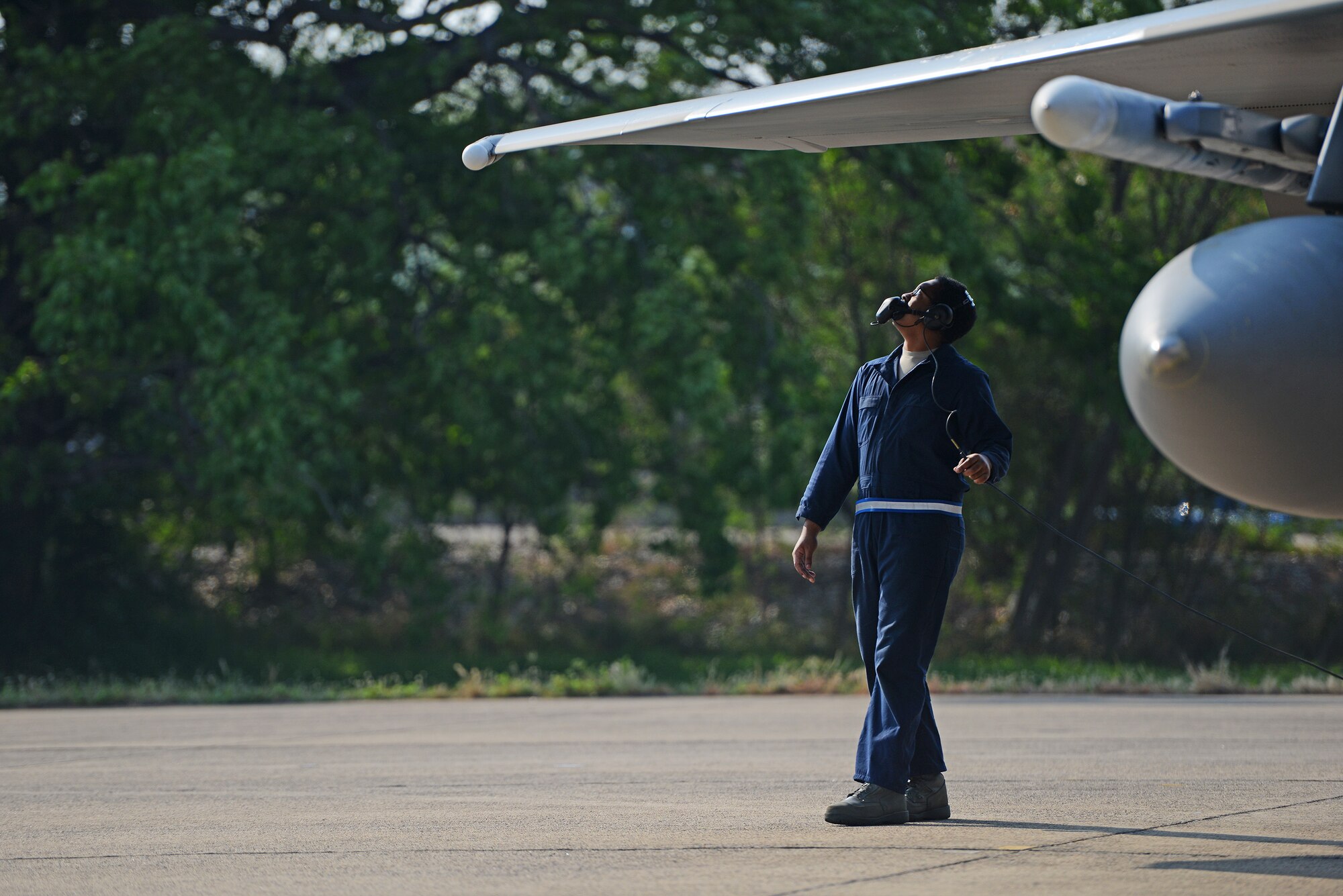 .S. Air Force Allen Shipman, a crew cheif with the 44th Fighter Squadron, Kadena Air Base, conducts a pre-flight inspection on an F-15C Eagle during COPE TIGER 2018 from Korat Air Base, Thailand, March 20, 2018.