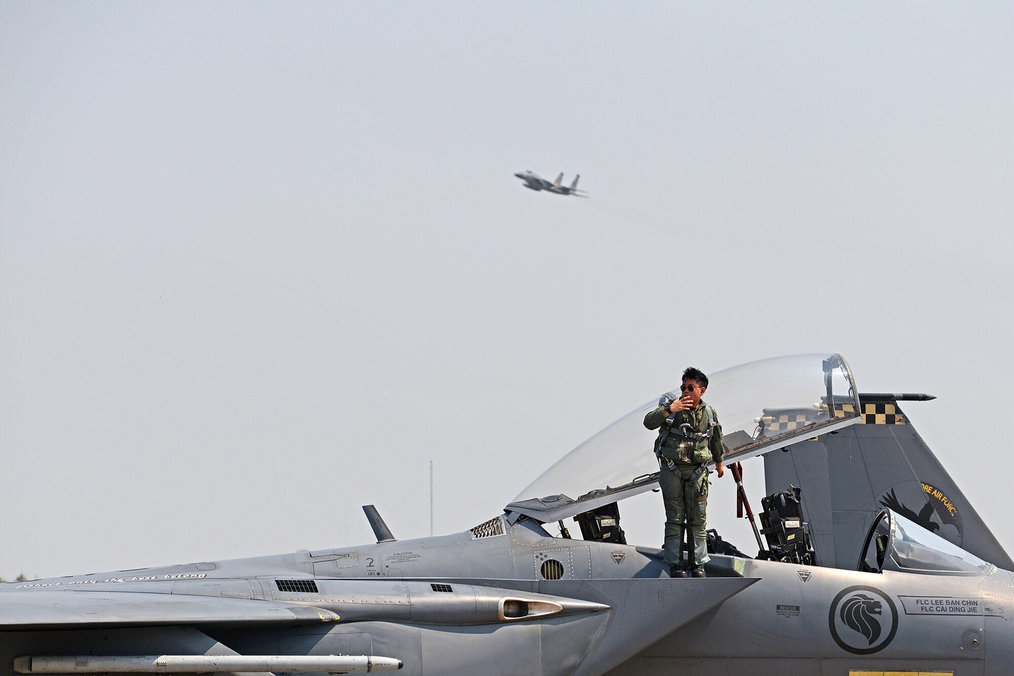 An F-15 pilot with the Republic of Singapore Air Force conducts a post-flight inspection during COPE TIGER 2018, Korat Air Base, Thailand, March 20, 2018.