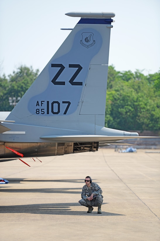 U.S. Air Force Master Sgt. Brad Huthsteiner, a maintenance flight chief with the 18th Equipment Maintenance Squadron, Kadena Air Base, Japan, oberves post-flight operations during COPE TIGER 2018 at Korat Air Base, Thailand, March 20, 2018.