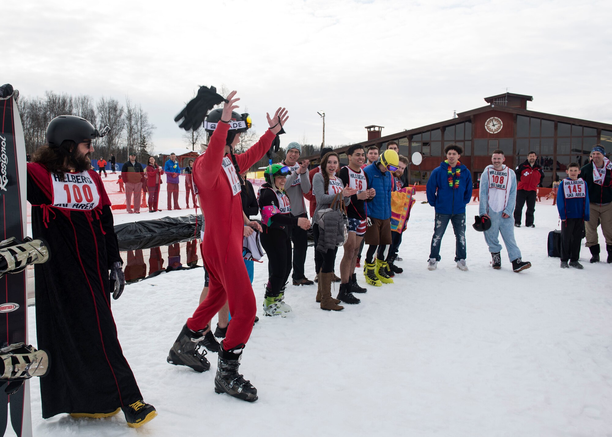 The 2018 Slush Cup participants congratulate the winners at the Joint Base Elmendorf-Richardson Hillberg Ski Area, March 18, 2018.The Slush Cup is a two-fold annual event celebrating the change in weather, consisting of skiers and snowboarders trying to make it across a man-made slush pond without falling. This year included Best Splash and Best overall categories as well as second and third place winners.